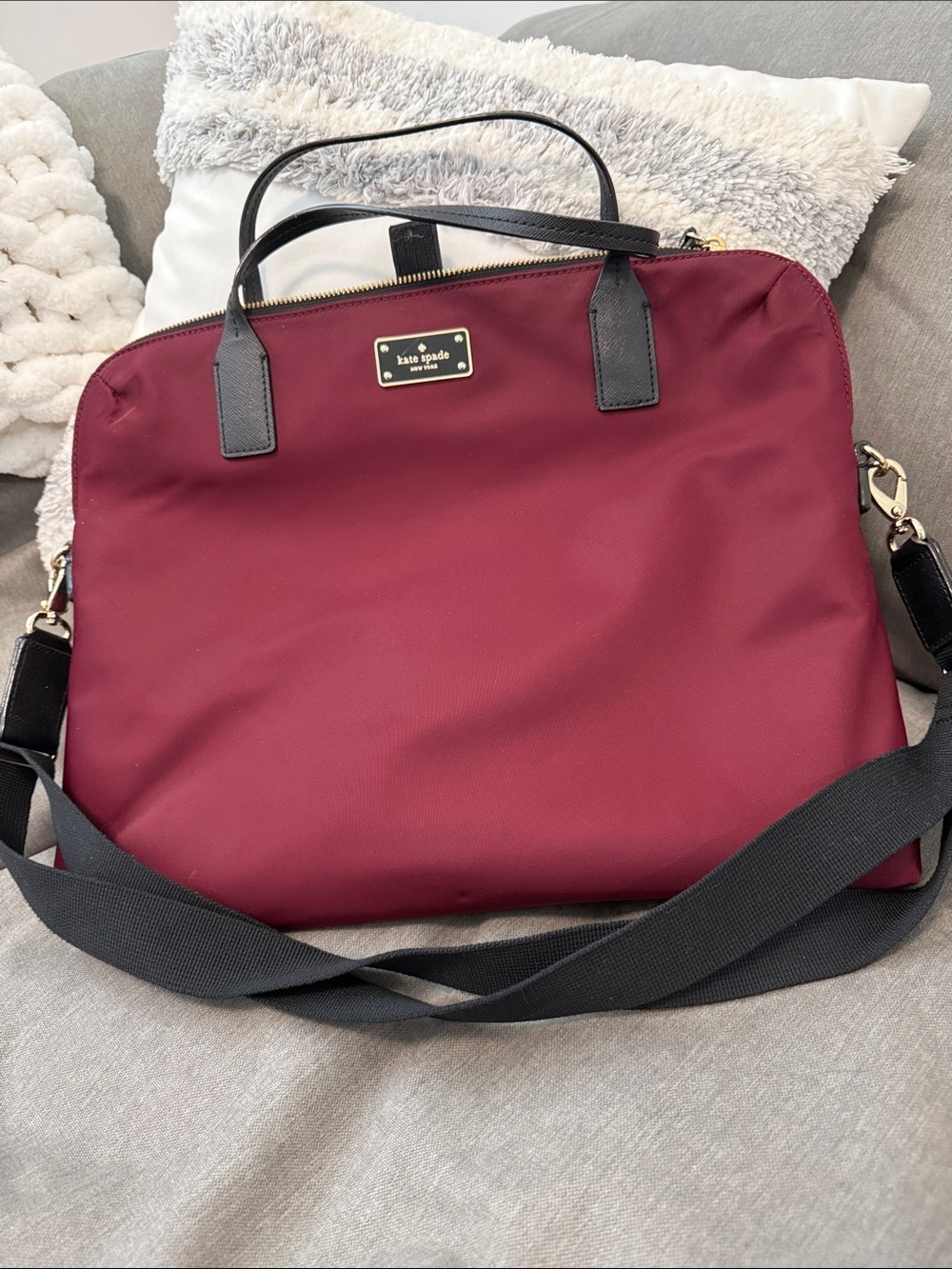 kate spade burgundy nylon tote with black trim and strap
